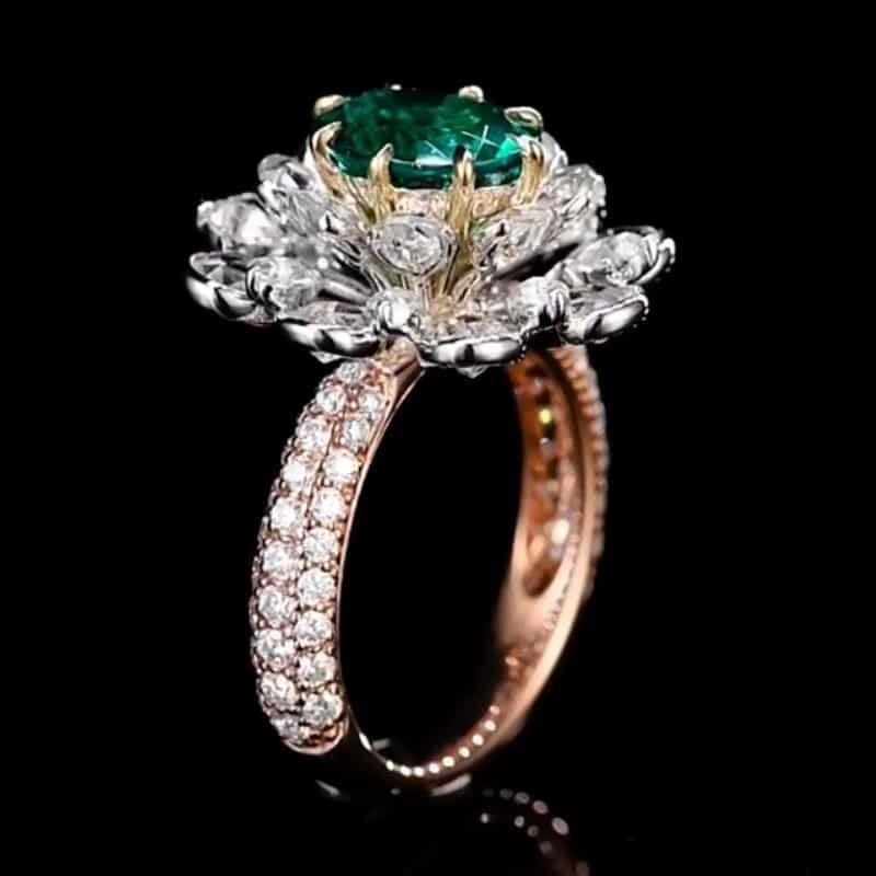 2 layers of flower shape finger ring with center oval emerald and clear AAA CZ micro paved