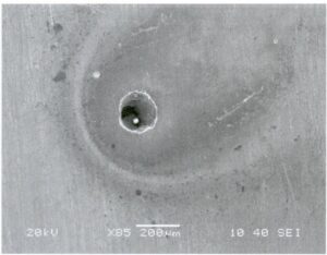 Entrapment porosity in castings, as shown in Figure 6-27.