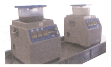 Figur 1-45 Magnetisk poleringsmaskin