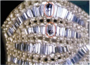 The condition of the damaged stone observed with a stereomicroscope