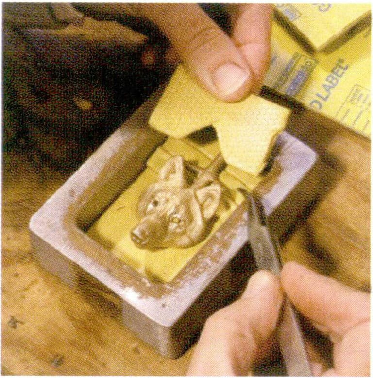 Cutting rubber and placing it into the frame