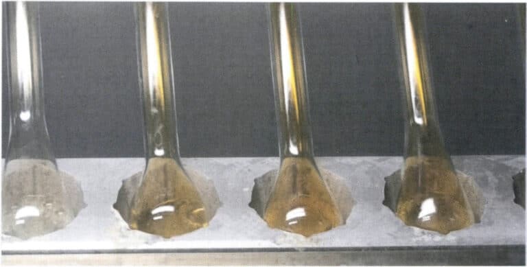 Figure 6-13 Separation using a separation flask and nitric acid (According to Paolo Battaini, 2013)