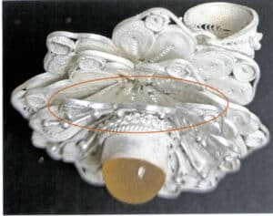 الشكل 7-2 المجوهرات الفضية المزخرفة عرضة للتشوه