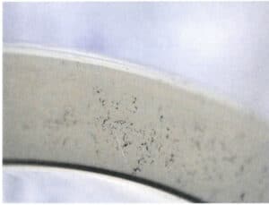 Figure 3-40 Air shrinkage porosity defect on the handle of a nickel 18KW ring