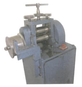 Figur 1-26 Elektrisk tablettpresse