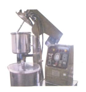 Figur 1-32 Automatisk vakuuminvesteringsmaskin 1