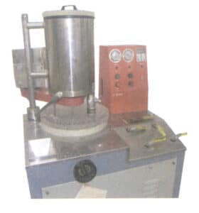 Figur 1-33 Automatisk vakuuminvesteringsmaskin 2