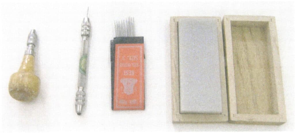 Figur 1-21: Chuck, stålnål, oljestein