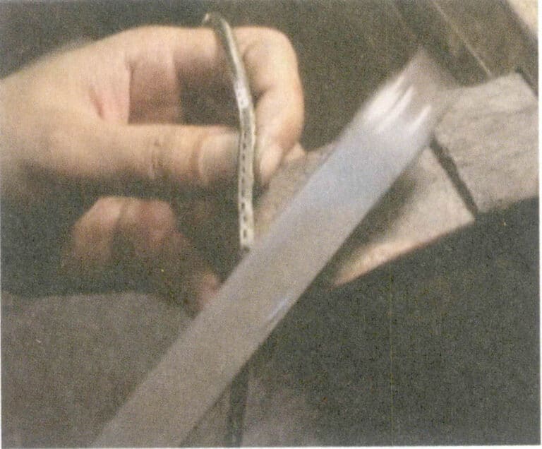 Figure 4-10 sanding wood bar