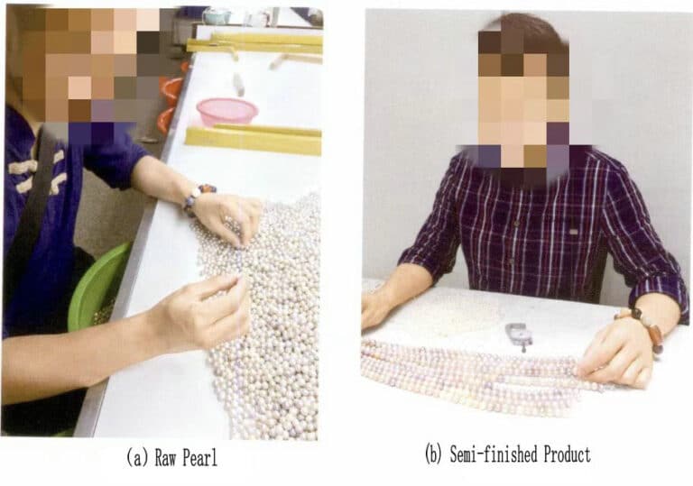 Figure 1-7-2 The author is conducting a quality evaluation of cultured pearls.
