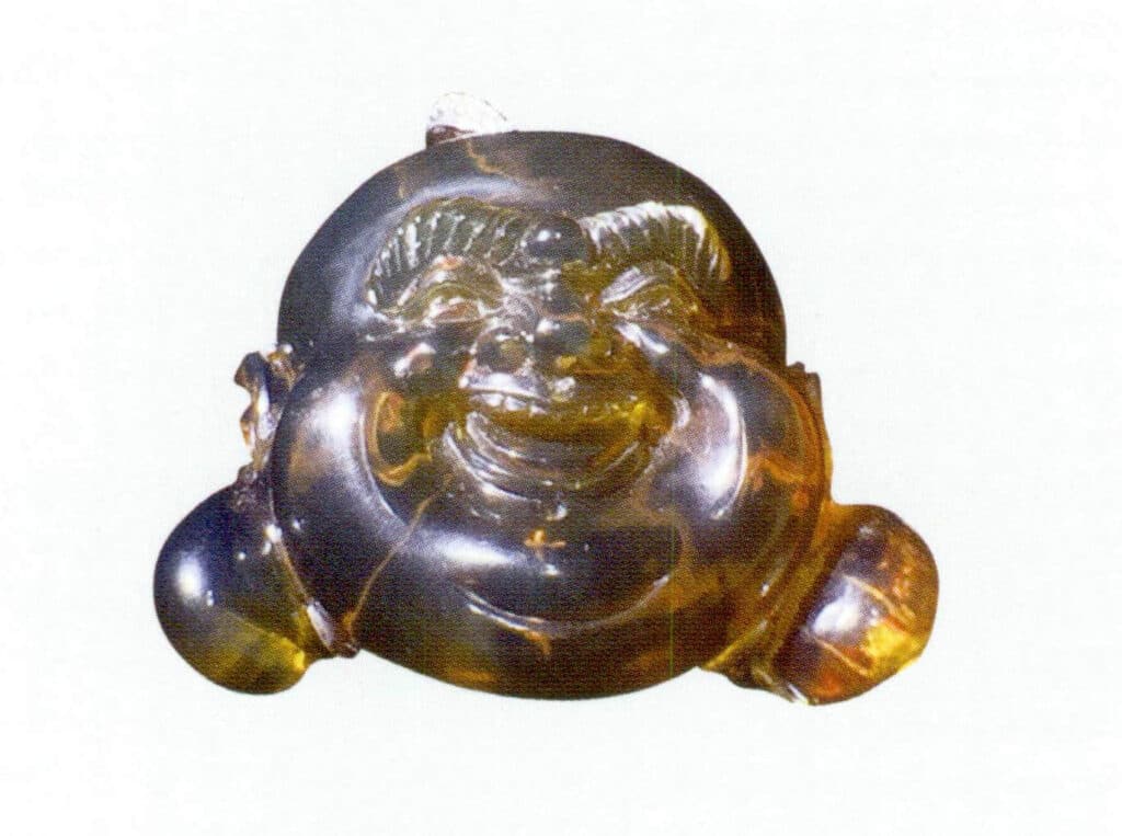 Figure 5-7-2 Well-Carved Dominican Blue amber with Slightly Poor Clarity