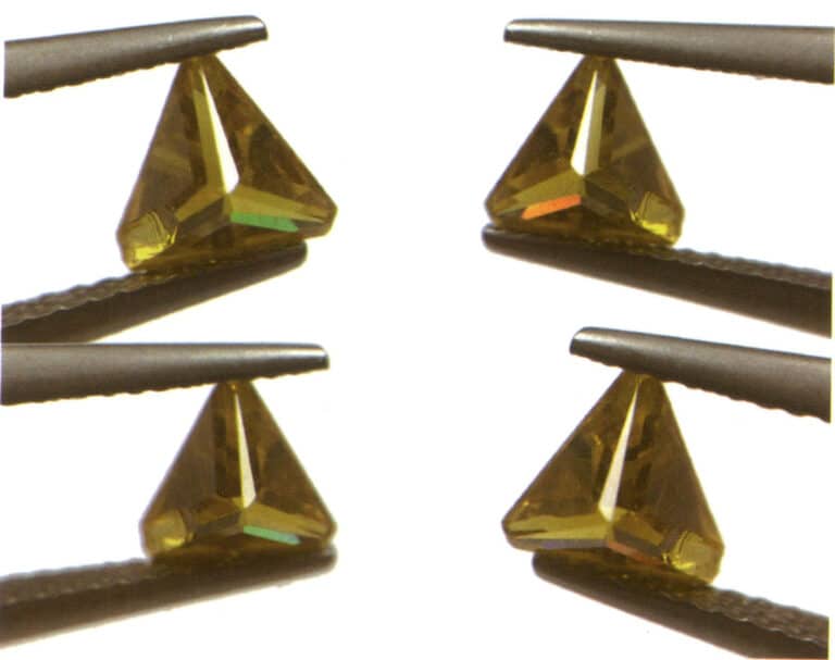 الشكل 2-3-89 تشتت العقيق الاصطناعي (يتغير لون ونوع المناطق الملونة في الشكل مع تدوير الحجر الكريم)