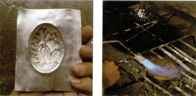 13. The spiny part of the cactus must be engraved from the back of the silver piece. Heat and melt the rosin pot, then place the silver piece in the pot to secure it.