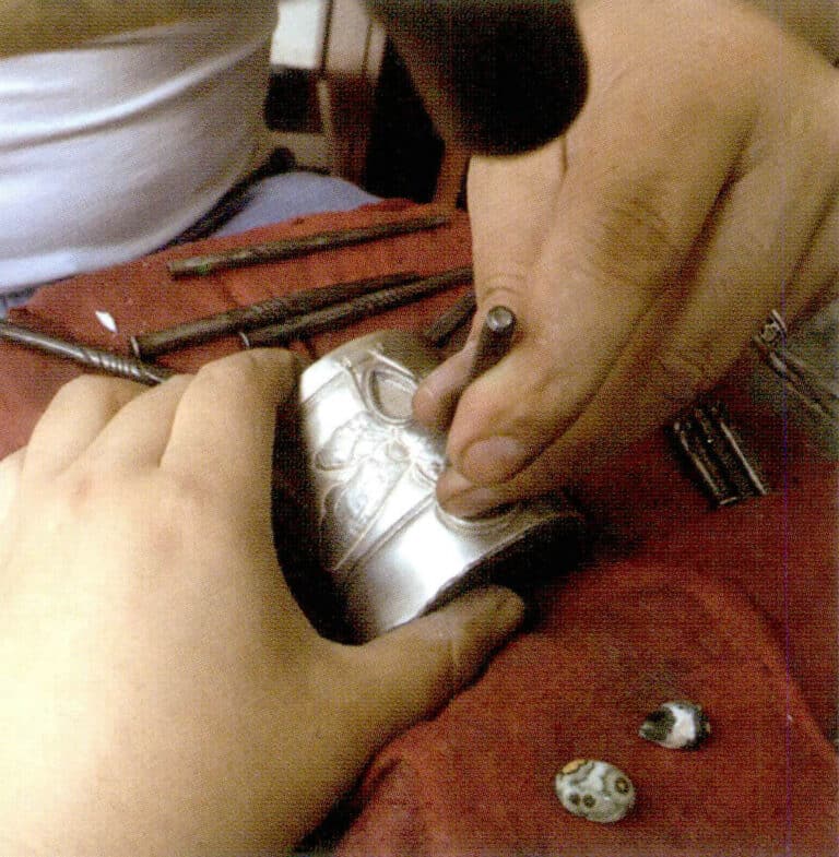 9. Use the lead block as a base for detailed engraving.