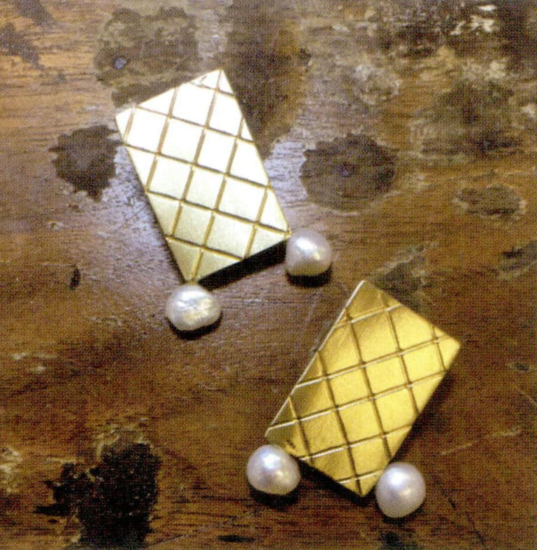 Secure the pearls firmly with 502 glue.