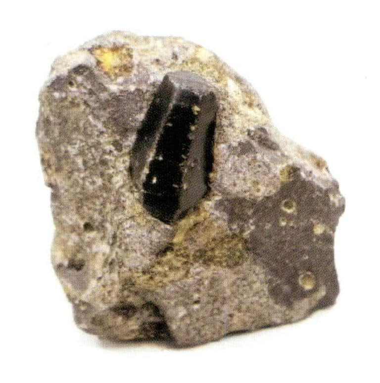 Figure 1-1 Natural sapphire crystals and their surrounding rock