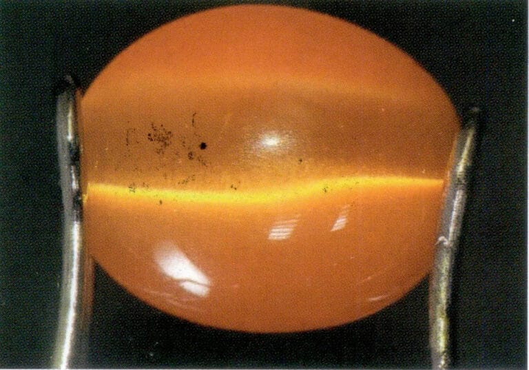 Figure 1-45 Glass Cat's Eye with a Set of Parallel Arranged Fibrous Inclusions