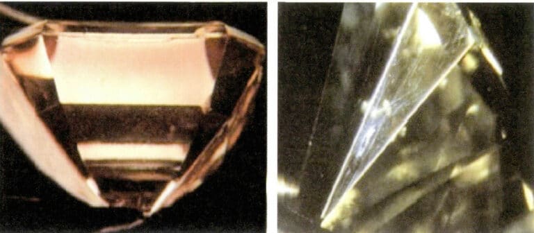 Figure 5-25 The diamond, after coating, appears orange-red and shows surface scratching phenomena.