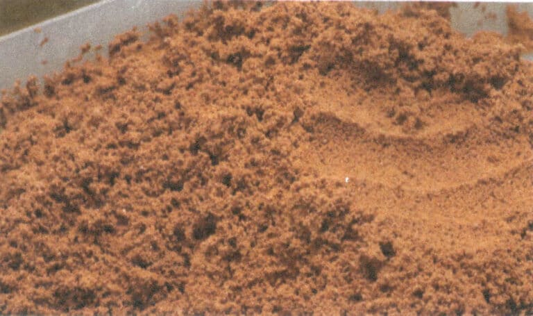 Рисунок 10-14 Распыление и смешивание красного песка