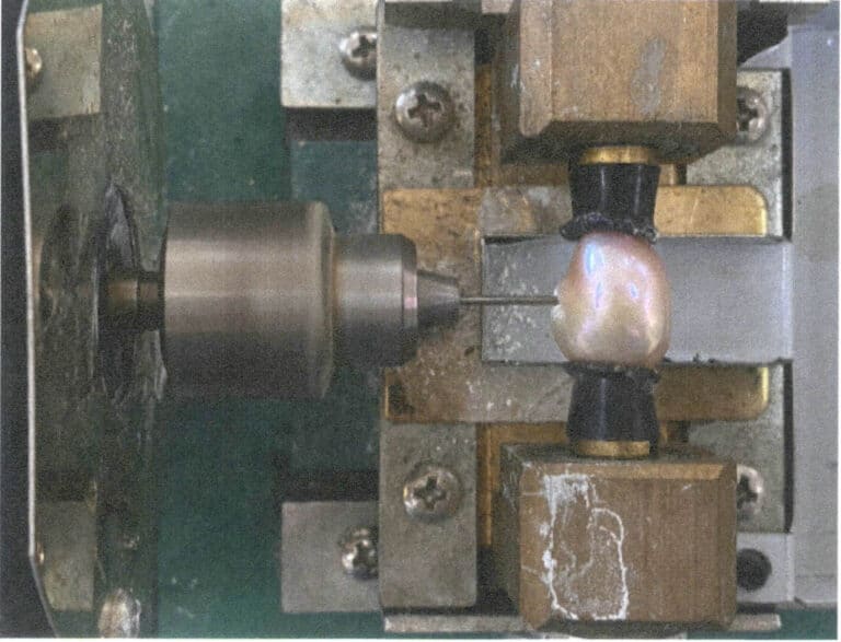 Рисунок 11-6 Станок для сверления отверстий