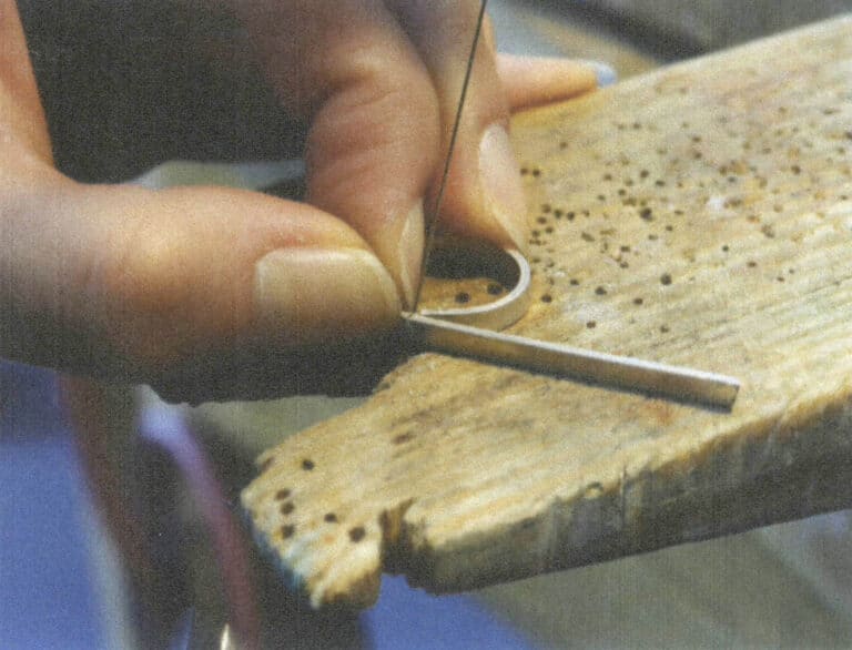 Figure 2-10 Cutting the metal edge