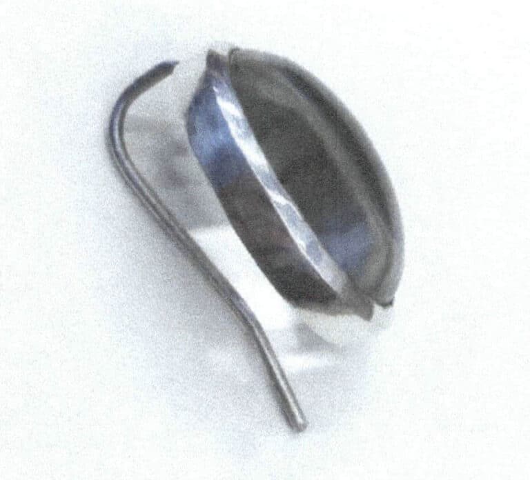 Figure 2-34 completes the oval-shaped cabochon gem bezel setting.