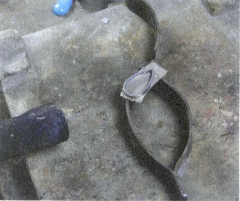 Figure 2-42 Welding the Metal Base