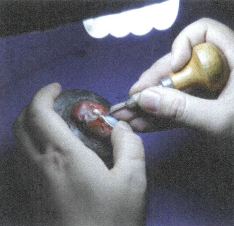 Figure 2-53 Trimming the inner metal edge of the metal