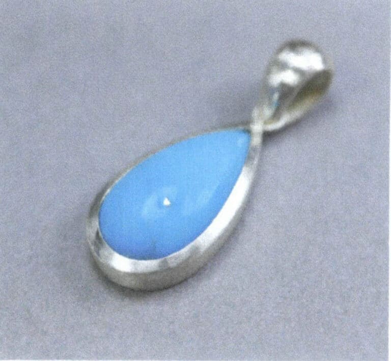 Figure 2-56 Completing the drop-shaped cabochon gemstone bezel setting
