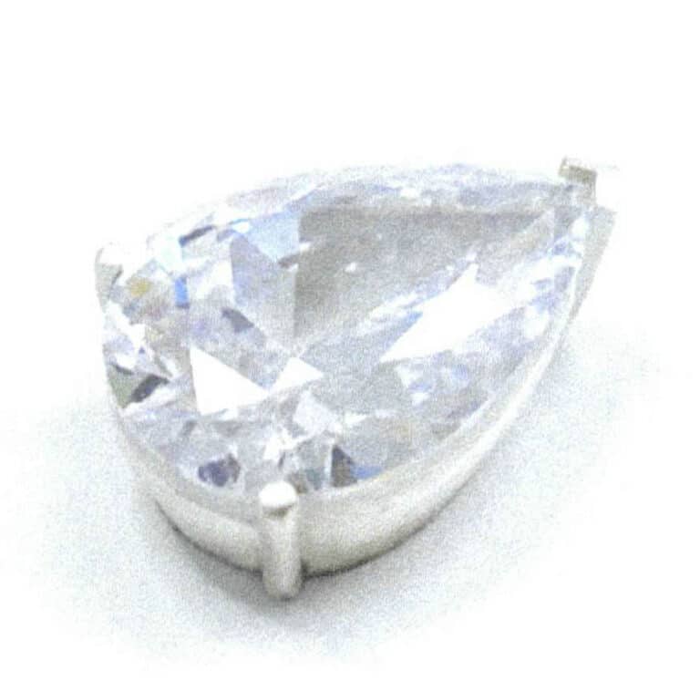 3-22. ábra A háromkarikás foglalat befejezése Csepp alakú, fazettált drágakővel