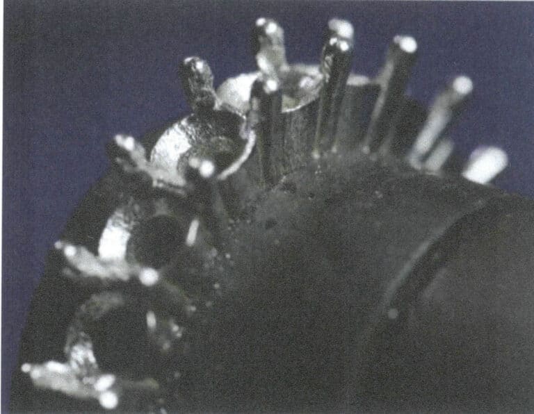 3-61. ábra Rögzített kerek szegecses kőbeállítás