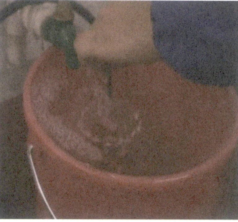 Figura 6-17 Risciacquo con acqua pulita