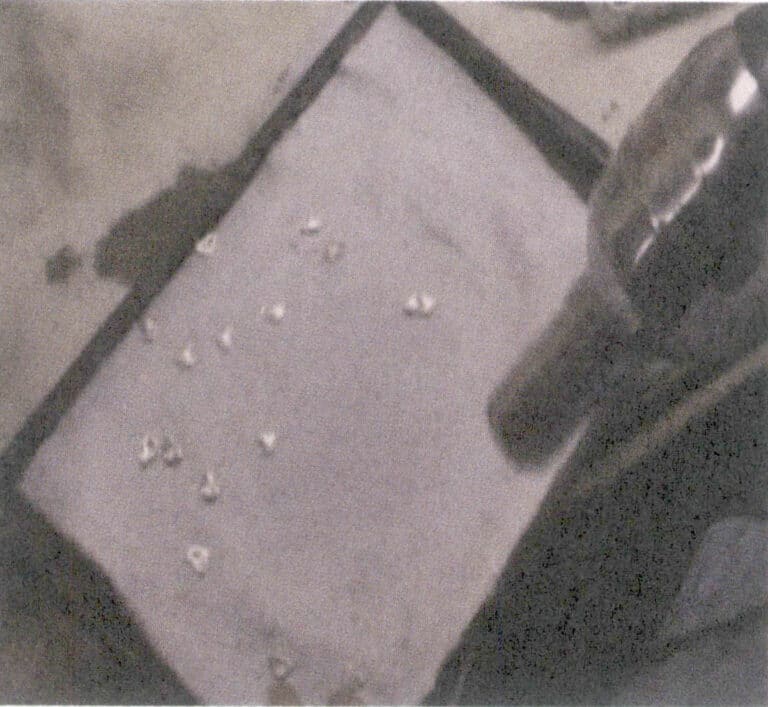 Figura 6-18 Asciugatura del pezzo in lavorazione