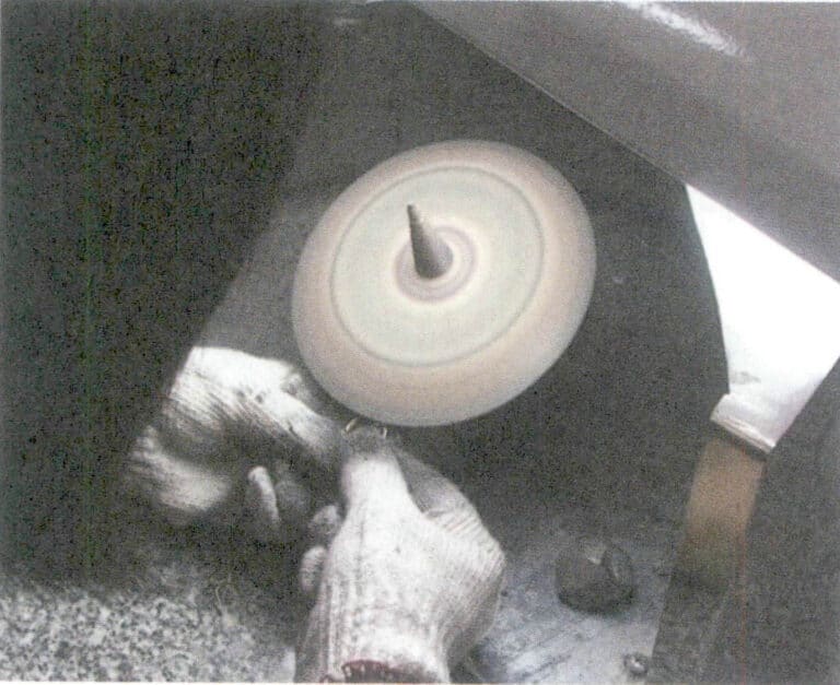 Figura 6-3 Lucidatura del disco