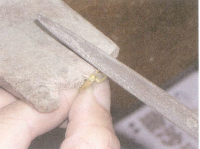 Figure 7-1 Filing the sprue