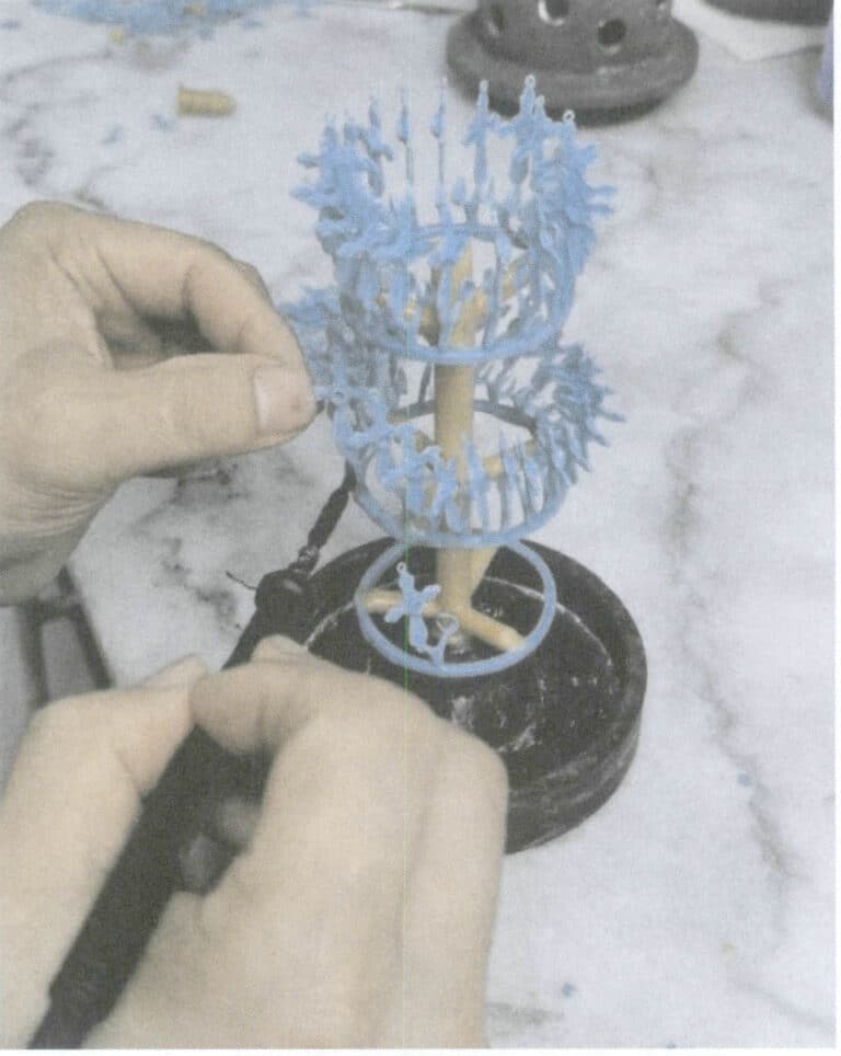 الشكل 4-22 لحام قالب الشمع بطبقة تلو الأخرى على العداء الأفقي