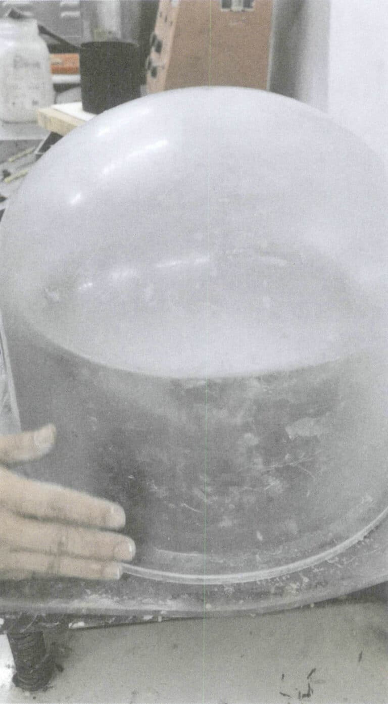 Figure 5-34 Vacuuming the Casting Powder Investment Slurry