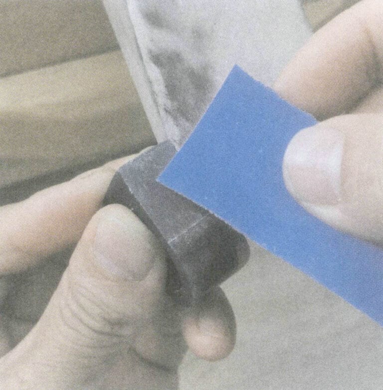 Figura 1-11 Polimento com lixa