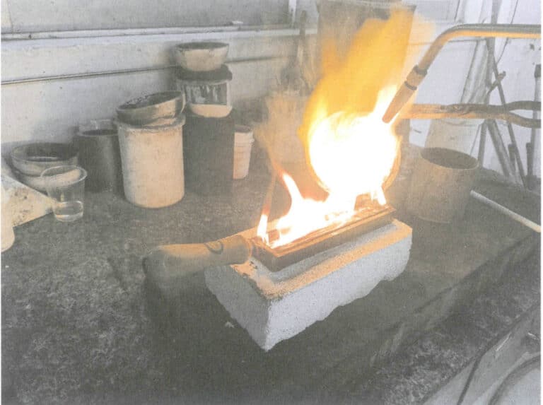 Figure 6-25 Pouring the ingot