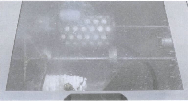 Figura 8-22 Lavaggio dell'albero di metallo incastonato a cera