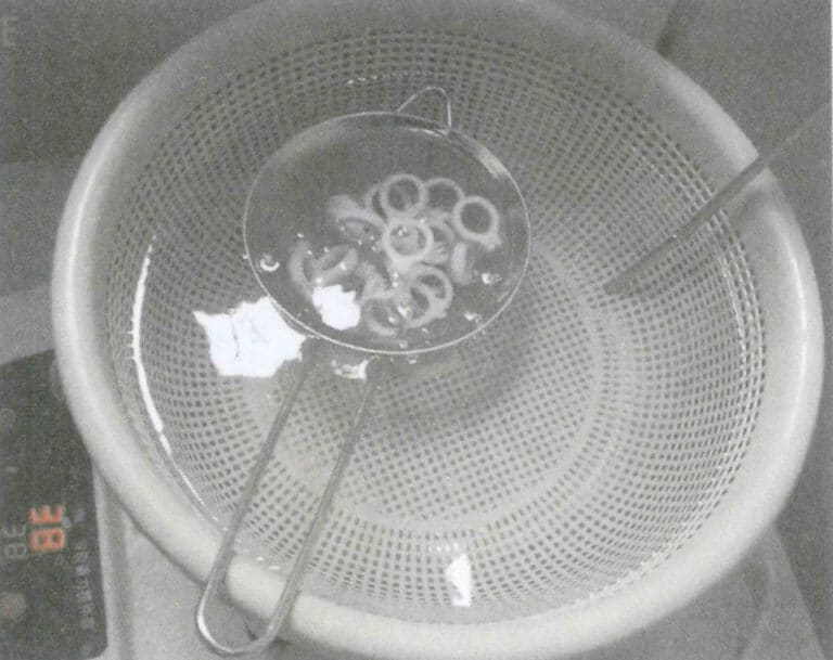 Figura 1-37 Limpeza do material de suporte