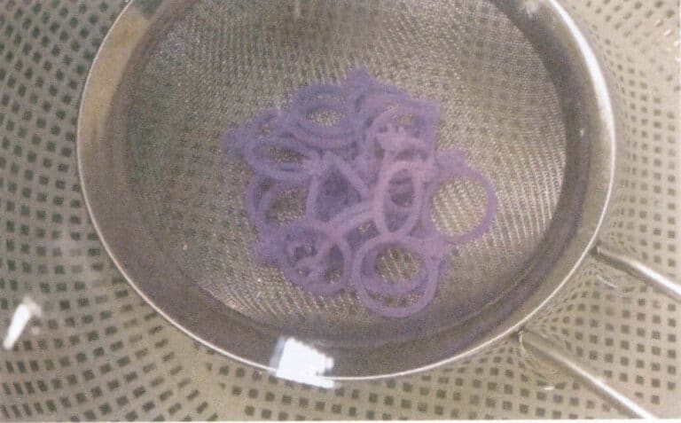 Figura 1-38 Dissolução do material de suporte