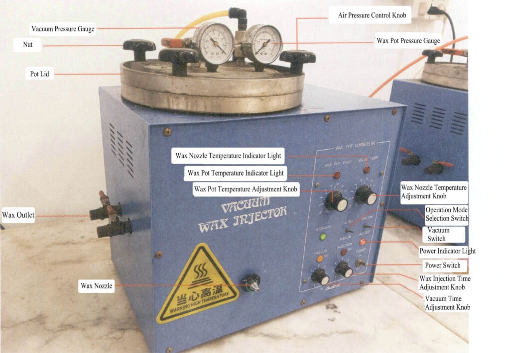 Figure 3-3 Vacuum wax injector