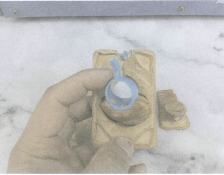 Figure 3-9 Removing the wax mold