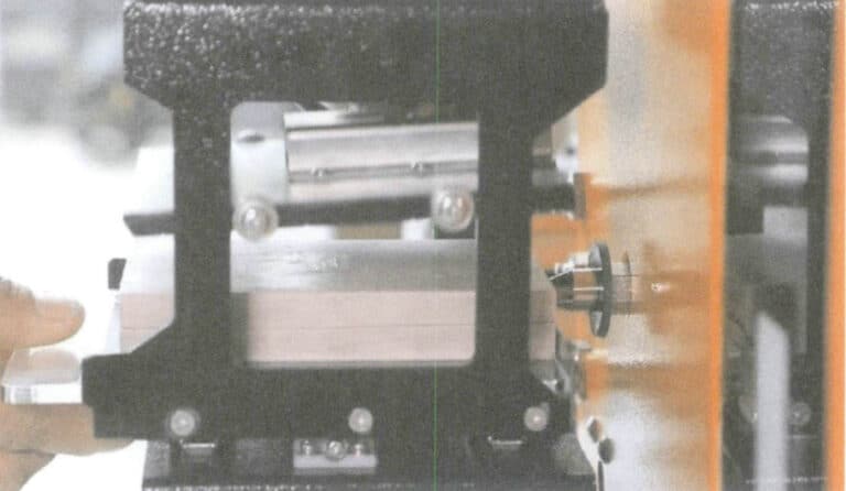 Figure 3-17 Place the mold into the robotic arm's clamp