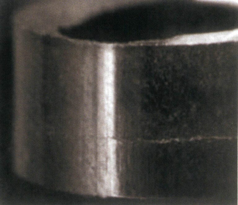 Figura 6-4 Aparecem fissuras transversais no bloco suprimido.