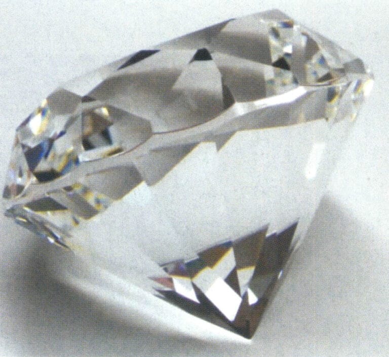 Round faceted stone made of glass