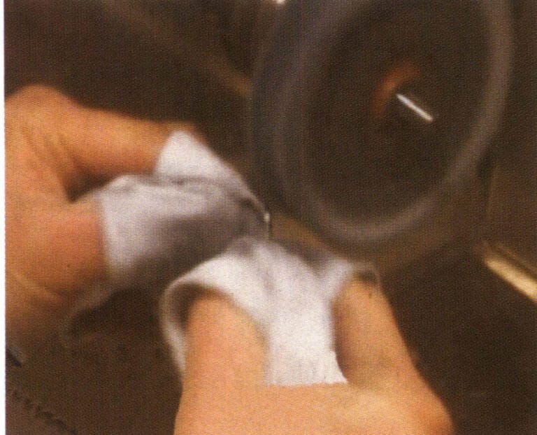 Figure 11-1 Cloth Wheel Polishing