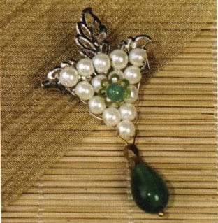 Figure 7-1 Design of the Luminous Pearl Harmony Brooch