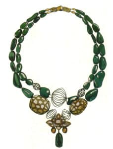 Step 06 Mix yellow ochre, flesh tone, and burnt umber to apply base layers to the pendant and clasp.